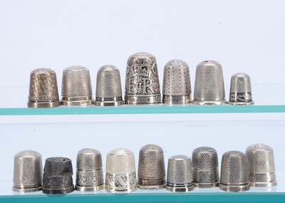 Lot 407 - A collection of silver & white metal thimbles