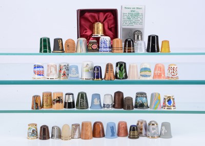 Lot 413 - A collection of porcelain and other thimbles