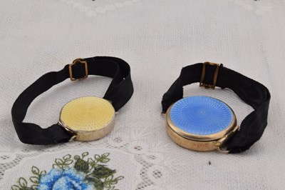 Lot 460 - Two guilloche enamelled circular silver compact bracelets