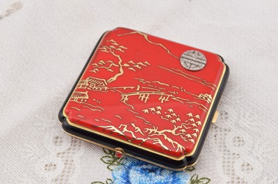 Lot 498 - A La Cloche Freres Paris c1925 square 18ct gold and enamelled square compact