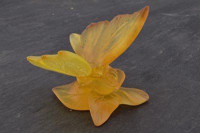 Lot 503 - A Daum Nancy pate-de-verre yellow glass model of a butterfly on a rose