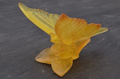 Lot 503 - A Daum Nancy pate-de-verre yellow glass model of a butterfly on a rose