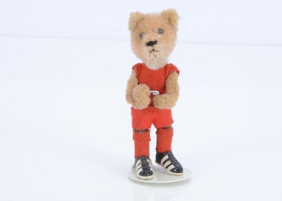 Lot 154 - A Schuco post-war teddy bear dressed as a footballer