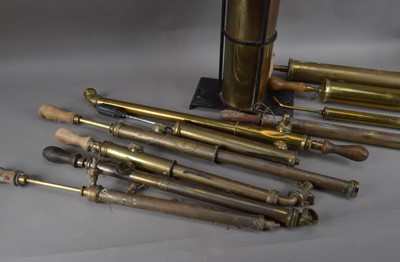 Lot 189 - A collection of antique brass hand pumps