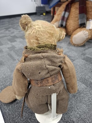 Lot 170 - Captain Bruiny, a rare Steiff teddy bear, circa 1908, home dressed in 1st World War British uniform and provenance