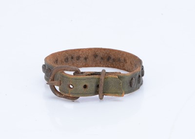 Lot 236 - A Steiff leather collar with fourteen buttons,  circa 1910