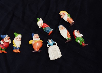 Lot 303 - Walt Disney Snow White and the Seven Dwarves plastic lapel pins, circa 1938