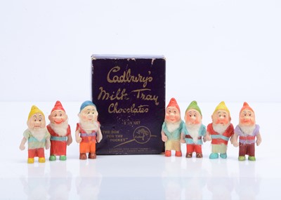 Lot 307 - Japanese bisque seven dwarves, 1940s