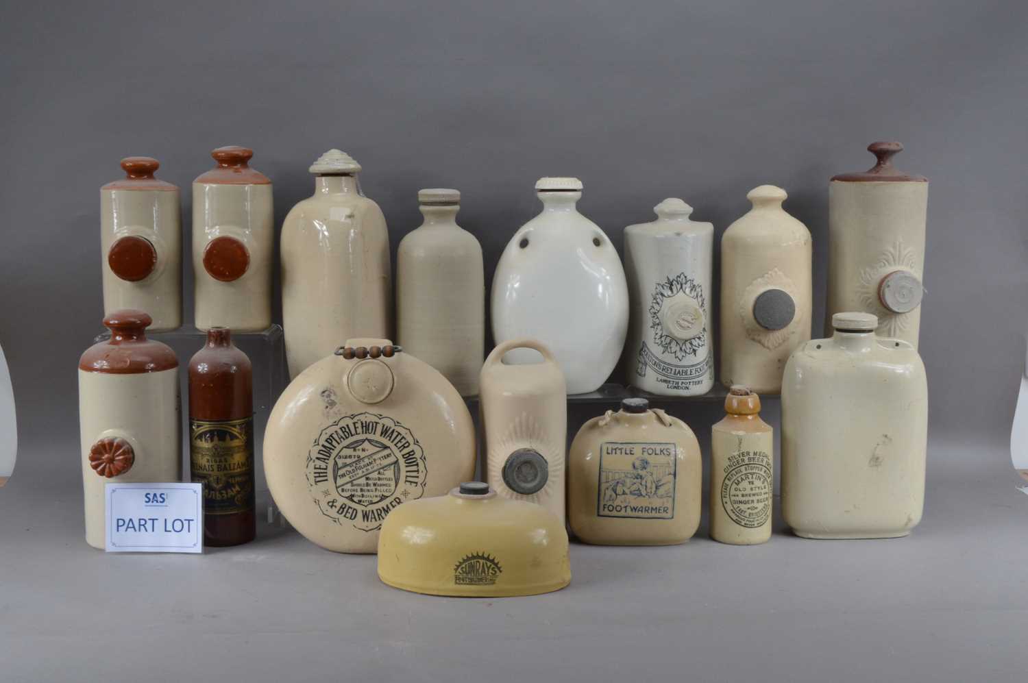 Lot 204 - A large collection of 19th century and later stoneware hot water bottles