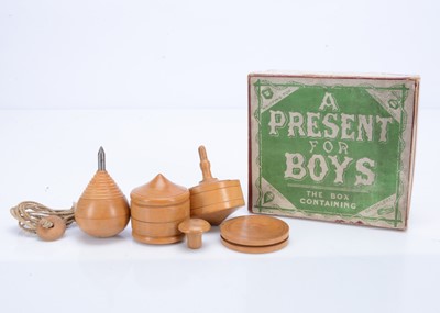 Lot 329 - Four turned boxwood toys ‘A Present For Boys’, circa 1900