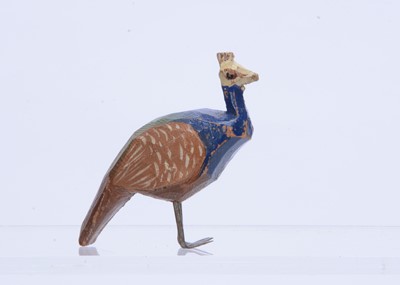 Lot 373 - A Forest Toys of Brockenhurst peahen