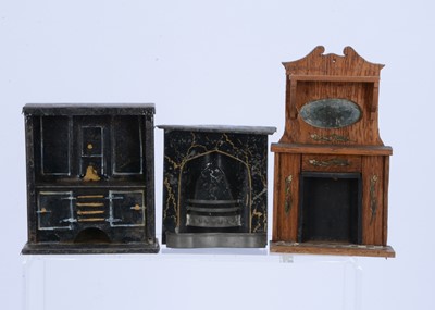 Lot 549 - Three dolls’ house fireplaces