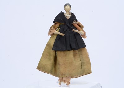 Lot 554 - A larger Grodnerthal carved wooden dolls’ house doll