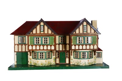 Lot 569 - A large Tri-ang No.93 stockbroker dolls’ house, 1950s