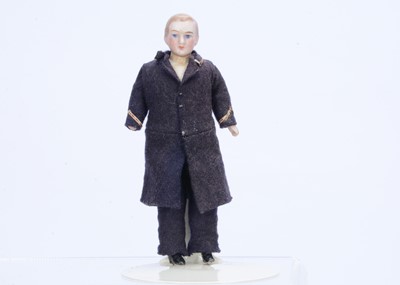 Lot 588 - A German bisque shoulder head male dolls’ house doll