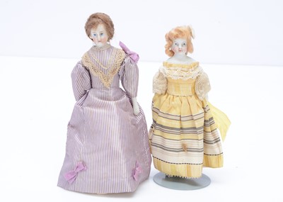 Lot 624 - Two white bisque shoulder-head dolls' house dolls