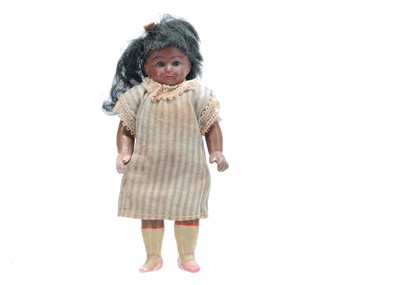 Lot 660 - A German brown bisque headed dolls’ house doll