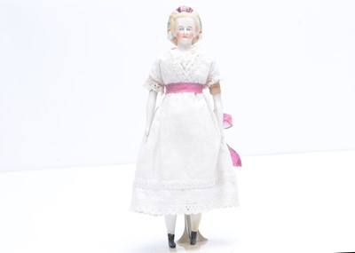 Lot 667 - A large 19th century German bisque shoulder-head dolls’ house doll