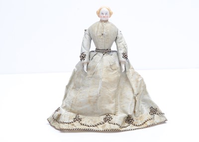 Lot 668 - A large 19th century German bisque shoulder-head dolls’ house doll