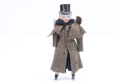 Lot 677 - A German bisque shoulder-head gentleman dolls’ house doll with moulded top hat