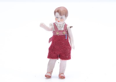 Lot 681 - A German all-bisque dolls’ house boy doll