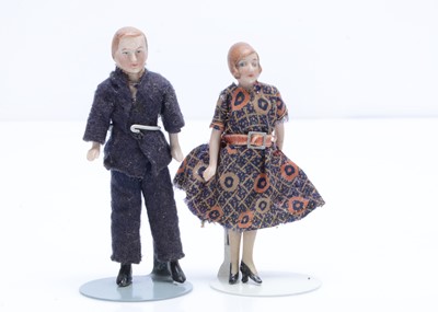 Lot 683 - A German all-bisque dolls’ house husband and wife