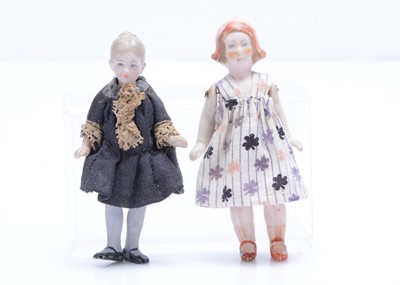 Lot 684 - Two German all-bisque female dolls’ house dolls