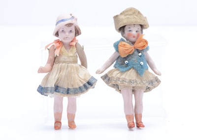 Lot 686 - Two German all-bisque dolls’ house girl dolls