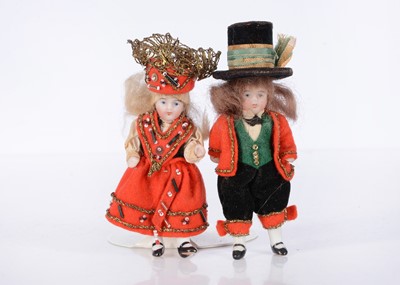 Lot 689 - Two all-bisque dolls’ house doll wedding couple