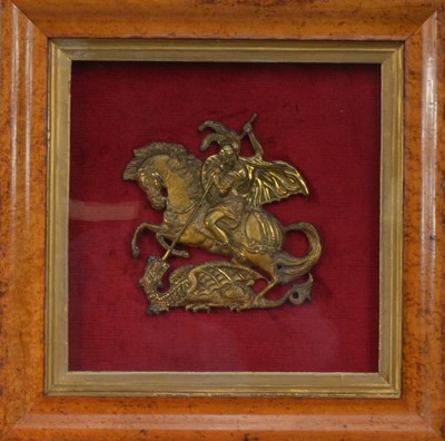 Lot 257 - A framed metal work depicting St. George slaying the dragon