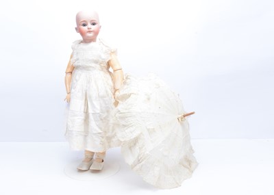 Lot 799 - A German bisque headed doll impressed 8