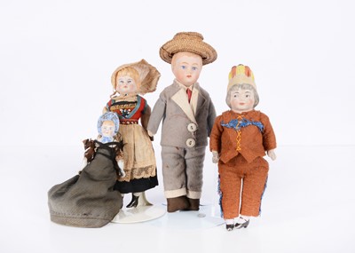 Lot 801 - Four small dolls