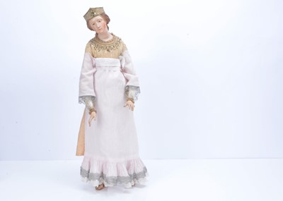 Lot 803 - A 19th century polychrome and terracotta creche figure of a noble woman