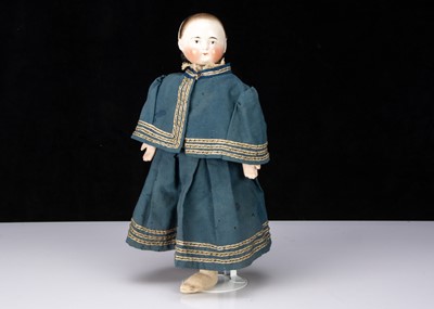 Lot 812 - An unusual 19th century china headed girl doll