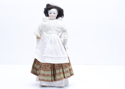 Lot 816 - A French porcelain shoulder-head fashion doll