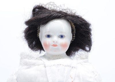 Lot 816 - A French porcelain shoulder-head fashion doll