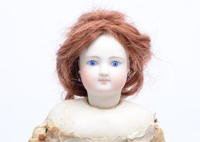 Lot 818 - A rare Simon & Halbig fashionable doll with twill covered wooden articulated body 1870s