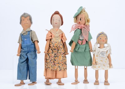 Lot 855 - Four Schoenhut Pinn family wooden dolls