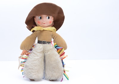 Lot 857 - A 1930s cloth cowboy doll