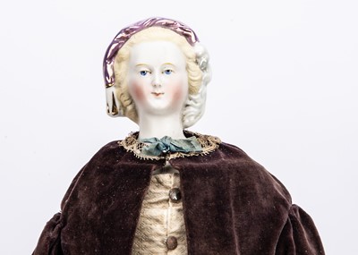 Lot 908 - An 19th century bisque shoulder head doll, known as Empress Eugenie