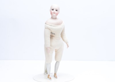 Lot 922 - A Gaultier bisque swivel head fashion doll