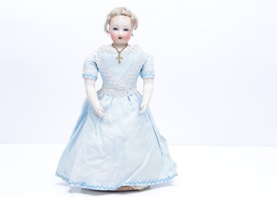 Lot 925 - A Jules Steiner pressed bisque swivel head walking fashionable doll, circa 1863