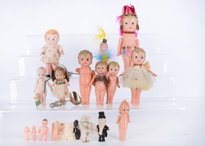 Lot 953 - A collection of Kewpie type dolls