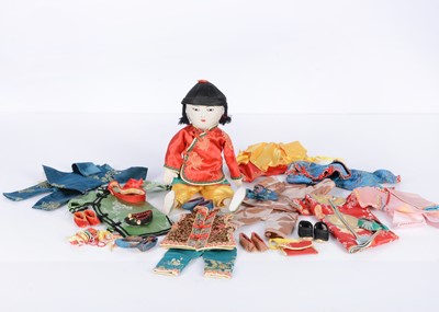 Lot 954 - An Ada Lum cloth doll with unusual additional clothing