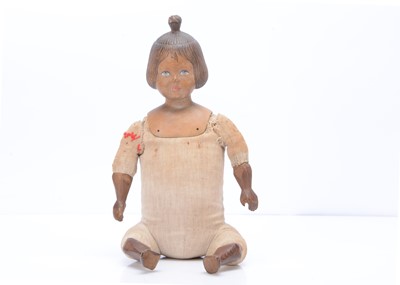 Lot 958 - An unusual Swiss carved wooden shoulder-head doll