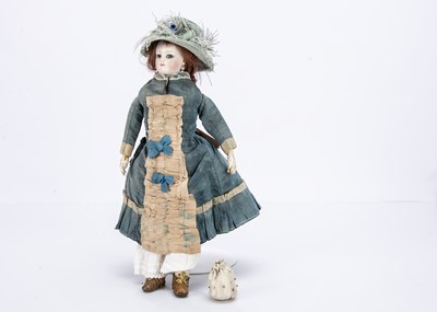 Lot 964 - A small French pressed bisque swivel head fashionable doll