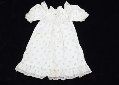 Lot 967 - A Jumeau bebe printed cotton dress