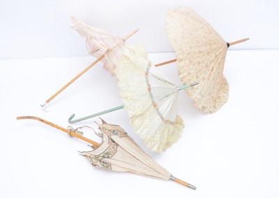 Lot 970 - Four French bebe doll’s parasols