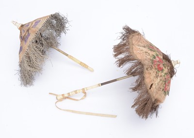 Lot 977 - Two fashion doll’s parasols with turned bone handles