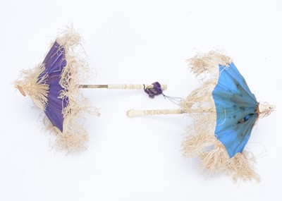 Lot 978 - Two fashion doll’s parasols with turned bone handles